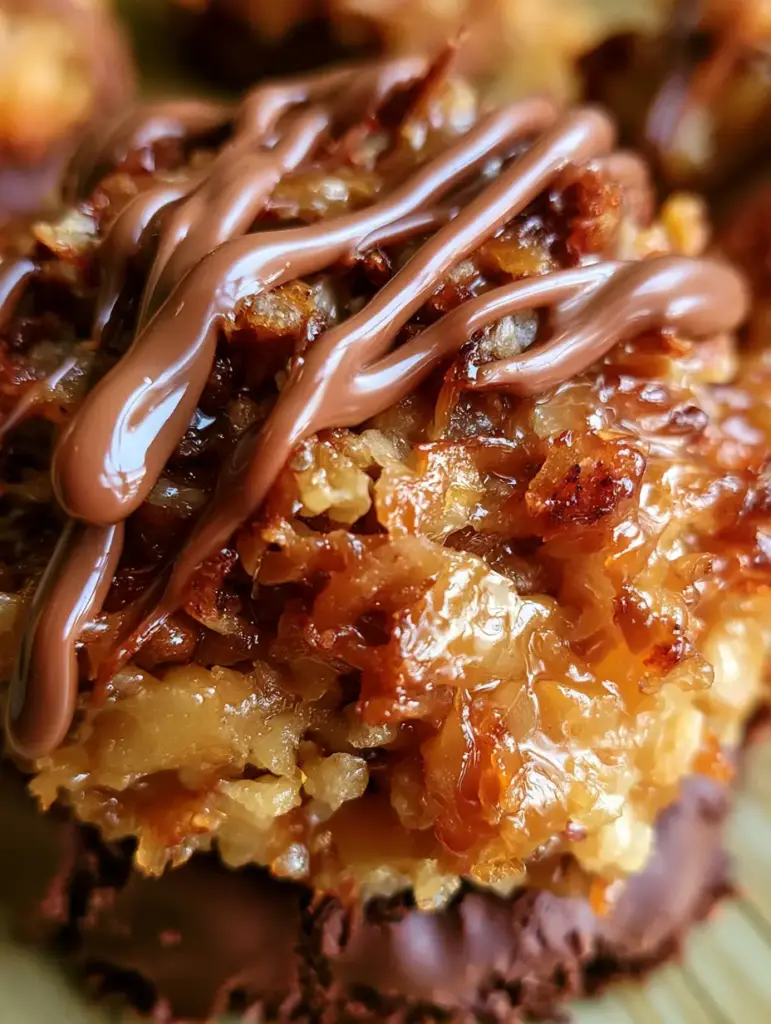 Samoa Delights: The Ultimate No-Bake Toasted Coconut and Caramel Treat 1 Close up of the golden-brown toasted coconut and shimmering caramel middle of the samoa delights.